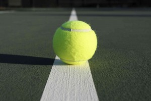 Tennis Ball Centered on the Court